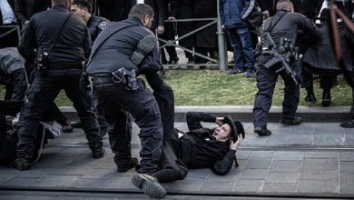 6190853
